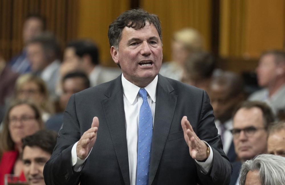 Infrastructure and Communities Minister Dominic LeBlanc rises during Question Period, in Ottawa, Tuesday, June 13, 2023. LeBlanc says details on the