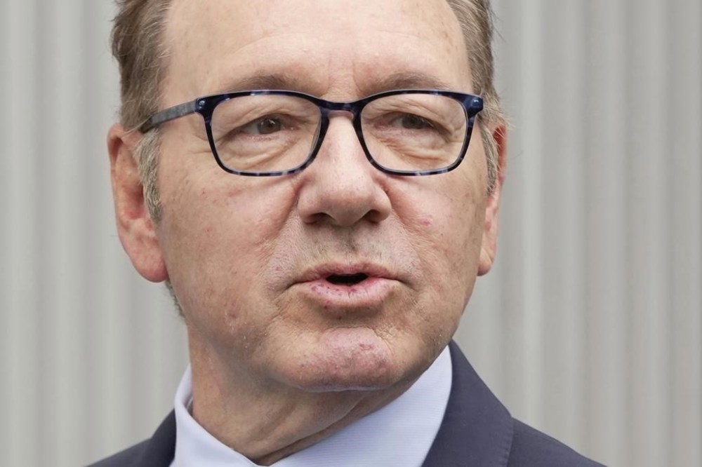 Actor Kevin Spacey arrives at Southwark Crown Court in London, Britain, Friday, July 14, 2023. Spacey faces hours of cross-examination Friday. The Oscar-winning actor, 63, has previously denied 12 charges, including sexual assault and indecent assault, alleged to have been committed over more than a decade. (AP Photo/Kin Cheung)