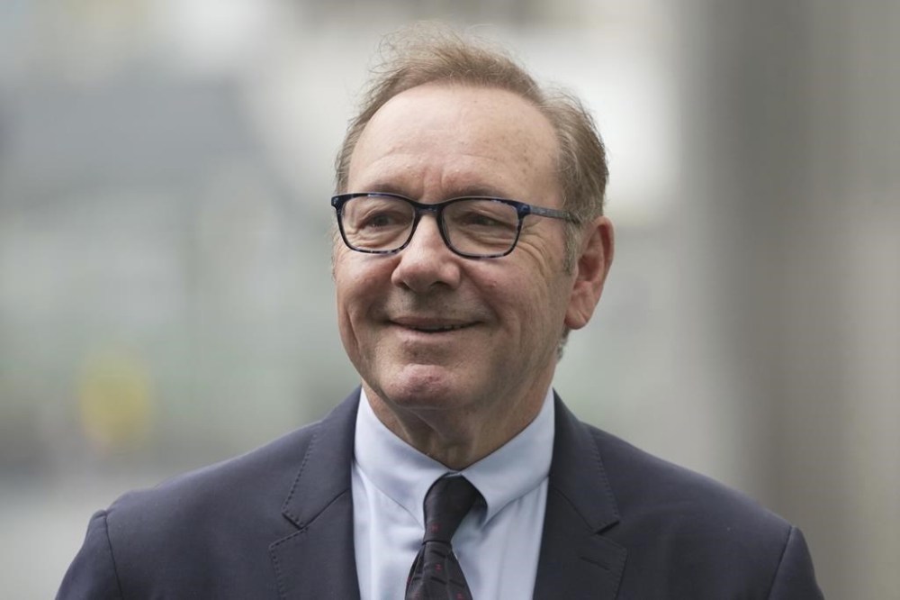 Actor Kevin Spacey leaves the Southwark Crown Court in London, Friday, July 14, 2023. Spacey denied that grabbing men by the crotch was his “trademark” pickup move as he got increasingly testy under questioning Friday by the prosecutor who accused him of sexually assaulting four men. (AP Photo/Kin Cheung)