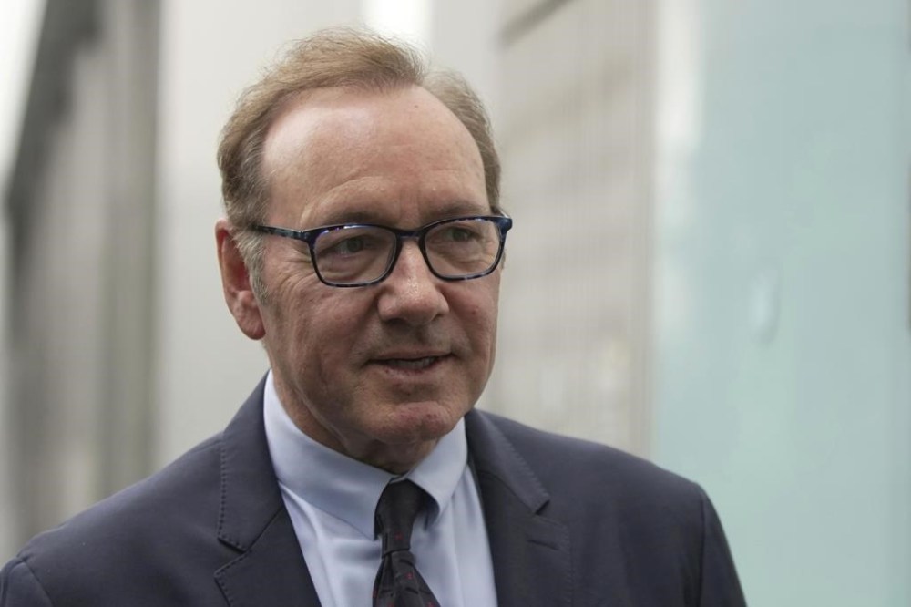 Actor Kevin Spacey leaves the Southwark Crown Court in London, Friday, July 14, 2023. Spacey denied that grabbing men by the crotch was his “trademark” pickup move as he got increasingly testy under questioning Friday by the prosecutor who accused him of sexually assaulting four men. (AP Photo/Kin Cheung)