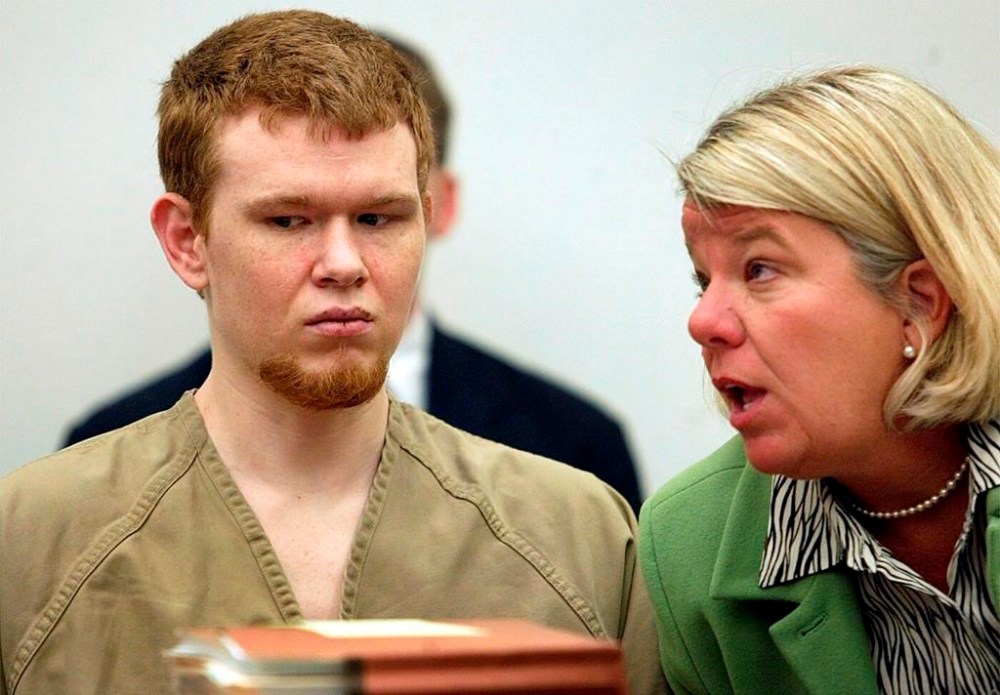 FILE - Johnny Johnson, left, listens as his attorney Bevy Beimbiek speaks during his sentencing hearing in St. Louis County Court in Clayton, Mo., March 7, 2005. Johnson who abducted and beat to death a 6-year-old girl was scheduled to be executed on Tuesday, Aug. 1, 2023, in Missouri, as his attorneys pressed claims that he is mentally incompetent. (Gabriel B. Tait/St. Louis Post-Dispatch via AP, File)