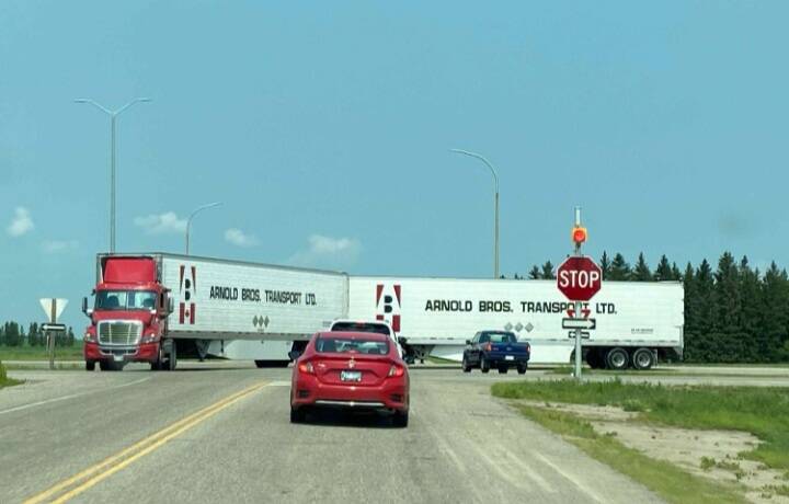 Carberry Mayor Ray Muirhead said this photo taken earlier this year by his wife helps show the problem with the intersection of the Trans-Canada Highway and Highway 5 near the town. The median between the east and westbound lanes is so short that vehicles like this semi have difficulty crossing it without obstructing traffic. (Submitted)