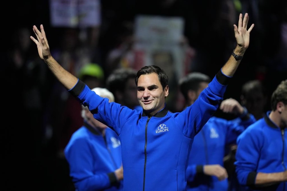An emotional Roger Federer of Team Europe acknowledges the crowd after playing with Rafael Nadal in a Laver Cup doubles match against Team World's Jack Sock and Frances Tiafoe at the O2 arena in London, Friday, Sept. 23, 2022. THE CANADIAN PRESS/AP-Kin Cheung