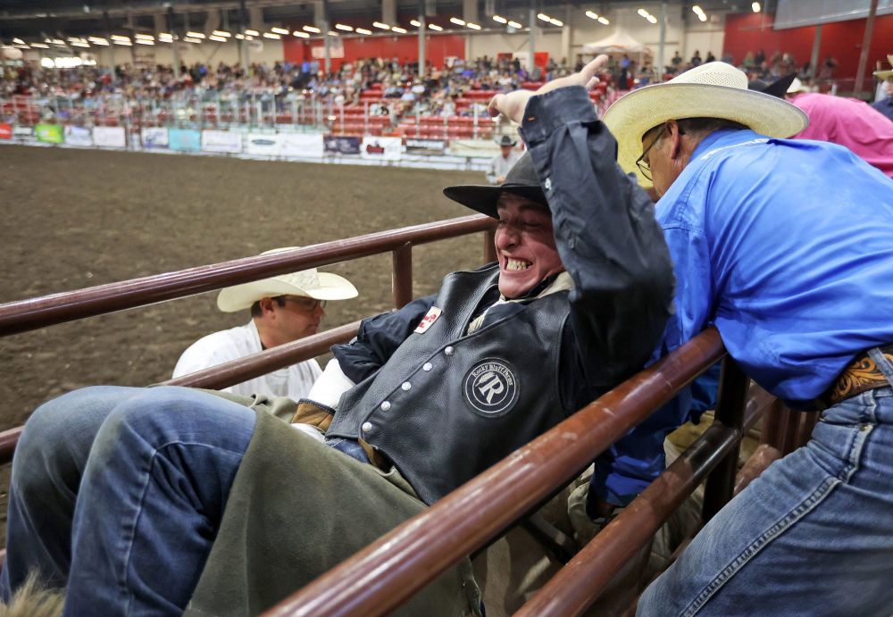 Cassien Haudegand grits his teeth just before the chute opens for his ride in the Saddle Bronc event at the Friday night go round of the Virden Indoor Rodeo at Tundra Oil & Gas Place. (Tim Smith/The Brandon Sun)