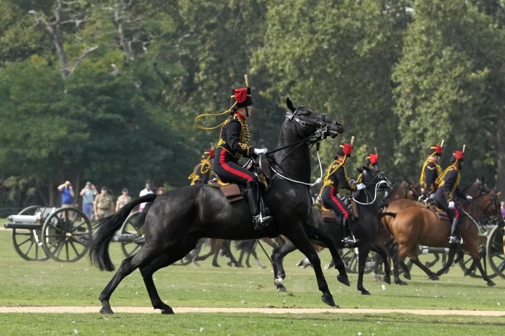 Queen Elizabeth II remembered a year after her death as gun salutes
