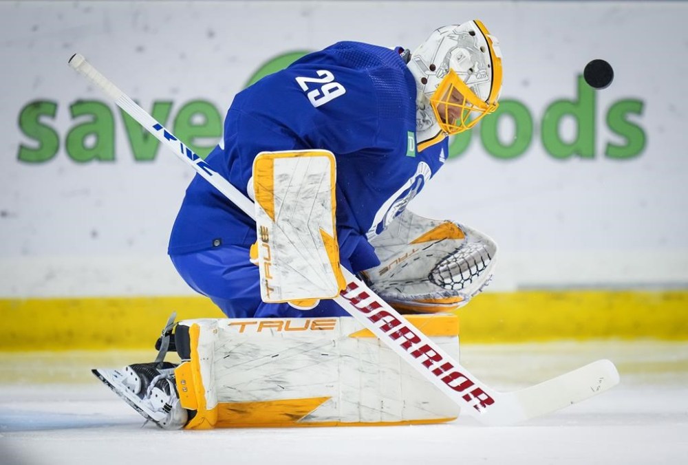 Vancouver Canucks goalie Casey DeSmith makes a save during the opening day of the NHL hockey team's training camp, in Victoria, Thursday, Sept. 21, 2023. THE CANADIAN PRESS/Darryl Dyck