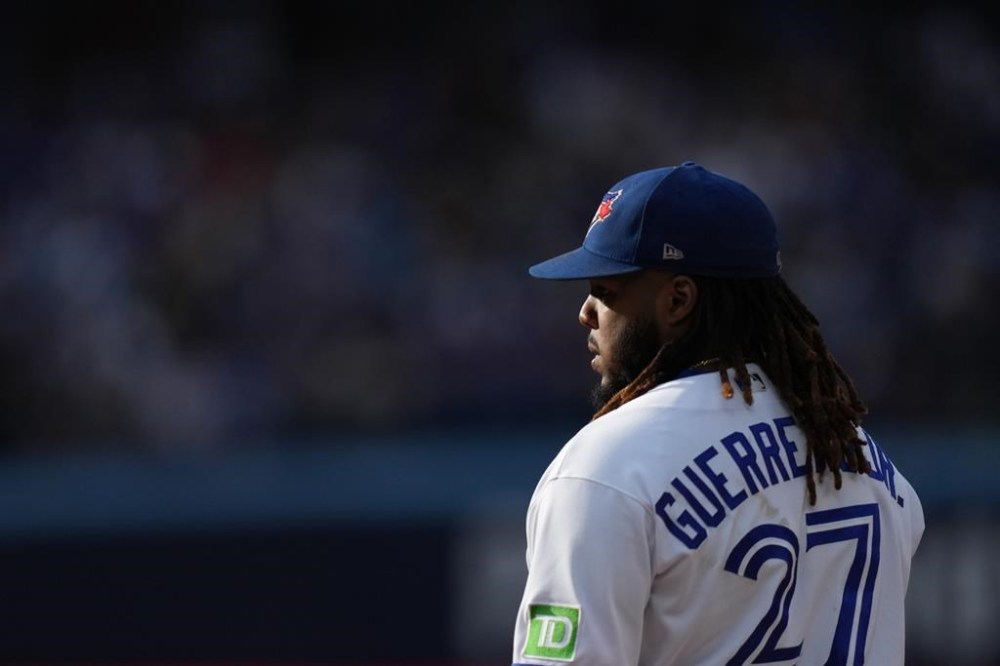 Toronto Blue Jays first baseman Vladimir Guerrero Jr. stands on first base during eighth inning American League MLB baseball action against Boston Red Sox in Toronto, Saturday, Sept. 16, 2023. Guerrero Jr. returned to the starting lineup Friday for Toronto's series opener against the Tampa Bay Rays.THE CANADIAN PRESS/Chris Young