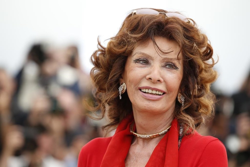 FILE - Italian actress Sophia Loren smiles during a photo call for