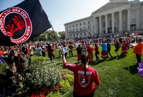 Supporters and family do a round dance as they gather at a rally to search Winnipeg landfill for three missing women at the Manitoba Legislative Building in Winnipeg on Sept. 18. Charles Adler writes that a recent Manitoba PC election ad that doubled down on the party's refusal to search the landfill is a confession of moral weakness within the party. (File)