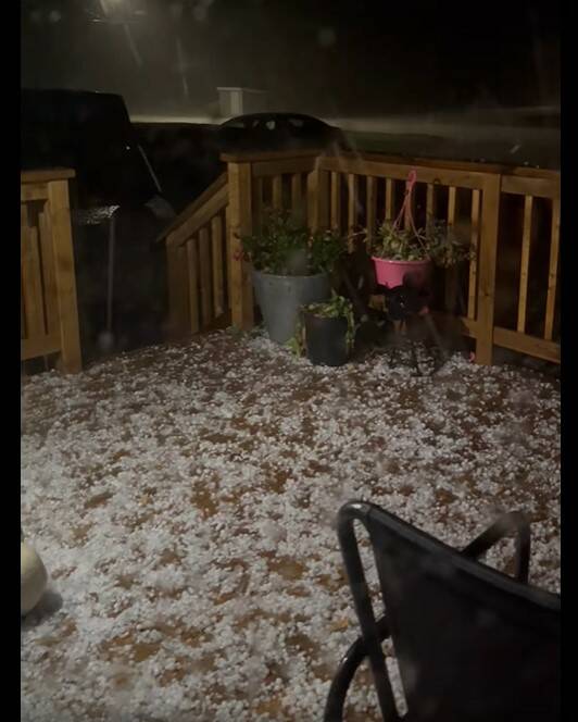Hailstones cover the back deck of Carey and Richard Marshall's home in Oakburn on Sunday night. (Submitted)