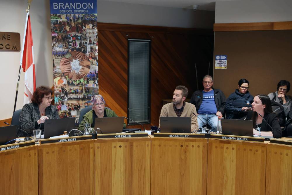 Brandon School Division board of trustees chair Linda Ross (left) and trustee Breeanna Sieklicki (right) debate whether a presentation connecting 2SLGBTQIA+ people to sexual grooming should be allowed to continue at Monday's board meeting. (Colin Slark/The Brandon Sun)