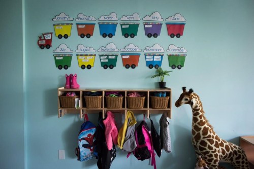 Children's backpacks and shoes are seen at a daycare facility in Langley, B.C., on May 29, 2018. An analysis by a public-policy think-tank has found that federal funding meant to bring $10-a-day child care across Canada has stumbled with a 