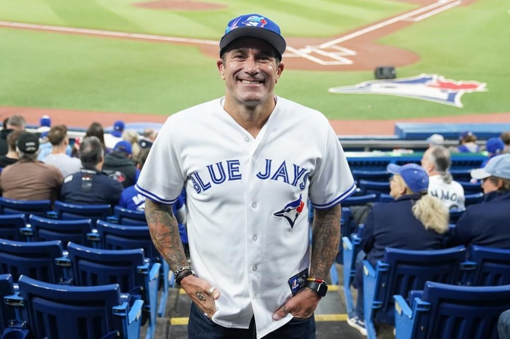 Jagger Long, owner of resale tickets business Karma Tickets, says sometimes people buy expensive seats to an event thinking it will only become more sought after in time and they can sell them for a profit. Long attends the Toronto Blue Jays and New York Yankees baseball game in Toronto on Thursday, Sept. 28, 2023. THE CANADIAN PRESS/Chris Young