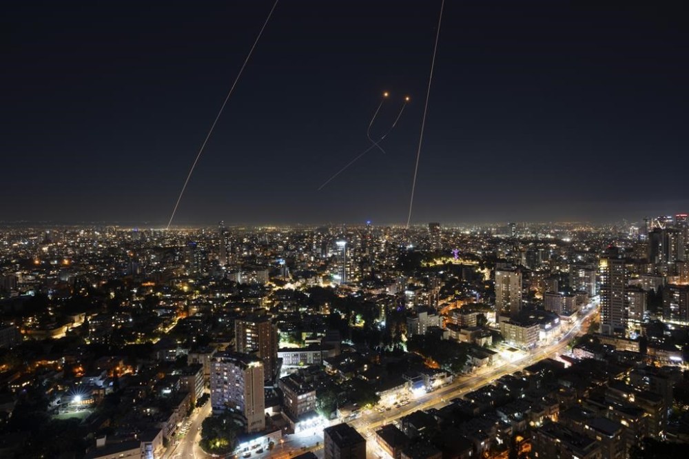 Israeli Iron Dome air defence system fires to intercept a rocket fired from the Gaza Strip, in central Israel, Thursday, Oct. 26, 2023. THE CANADIAN PRESS/AP-Oded Balilty