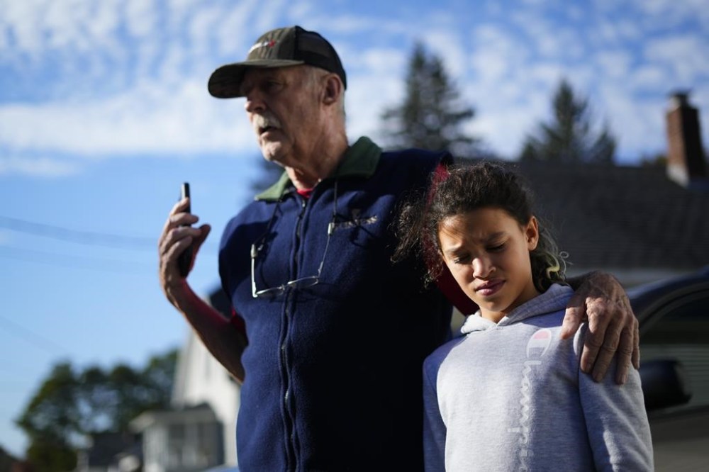 RETRANMISSION TO CORRECT LOCATION - Fern Asselin who's daughter Tammy Asselin, and granddaughter, Toni, right, were at the Just-in-Time Recreation bowling alley during the recent mass shooting, speaks during an interview in Lewiston, Maine, Friday, Oct. 27, 2023. (AP Photo/Matt Rourke)