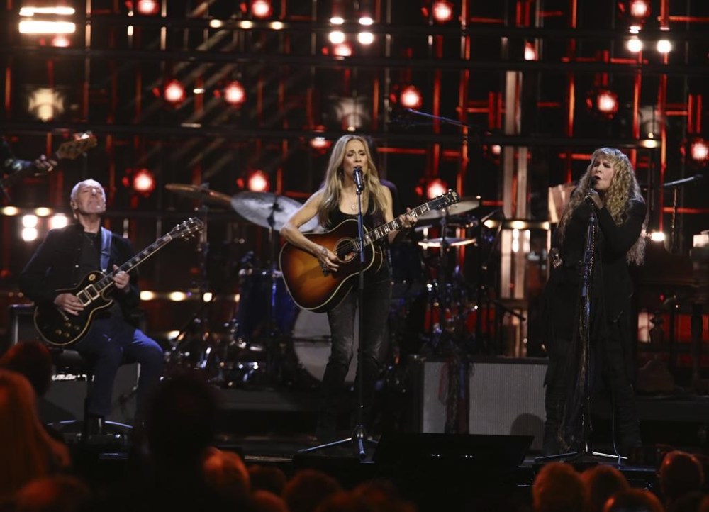 Peter Frampton, from left, Sheryl Crow, and Stevie Nicks perform during the Rock & Roll Hall of Fame Induction Ceremony on Friday, Nov. 3, 2023, at Barclays Center in New York. (Photo by Andy Kropa/Invision/AP)