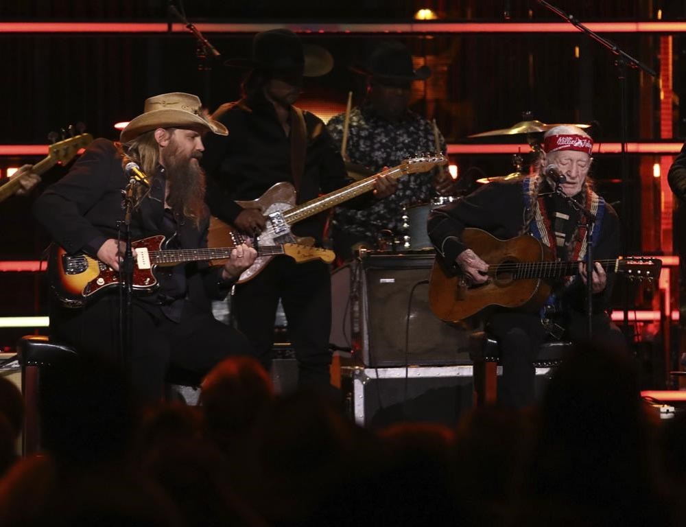 Chris Stapleton, left, and Willie Nelson perform during the Rock & Roll Hall of Fame Induction Ceremony on Friday, Nov. 3, 2023, at Barclays Center in New York. (Photo by Andy Kropa/Invision/AP)