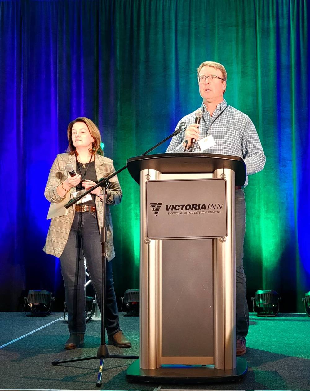 Tanis (right) and Derek (left) Axten, owners of Axten Farms Ltd. in Minton, Sask., spoke at the conference on shifting practices in farming that will help to shape a healthier world for tomorrow. (Miranda Leybourne/The Brandon Sun)