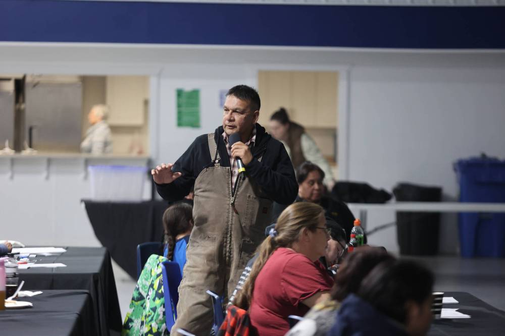 A man named Travis, who identified himself as a community safety officer, speaks during a meeting at Sioux Valley Dakota Nation's Veterans Hall on Monday evening. The meeting was to discuss a new law that allows for the banishment of people judged to be a serious threat to the community. (Colin Slark/The Brandon Sun)