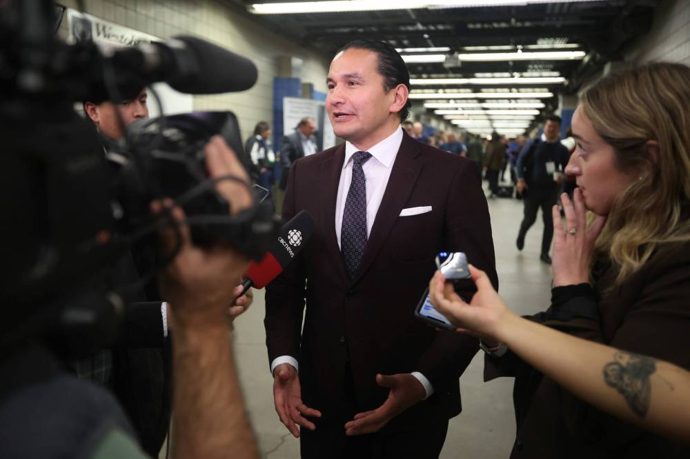 Manitoba Premier Wab Kinew answers questions from reporters after taking part in the bear pit session at the Association of Manitoba Municipalities fall convention at the Keystone Centre on Thursday. (Tim Smith/The Brandon sun)