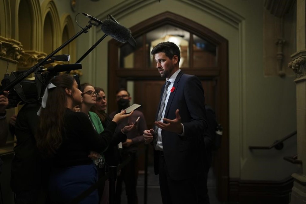 Minister of Housing, Infrastructure and Communities Sean Fraser speaks to reporters as he leaves a cabinet meeting on Parliament Hill in Ottawa on Tuesday, Nov. 7, 2023. The mayor of Halifax and the federal housing minister both say they were surprised by premiers complaining about being left out of housing deals between the federal government and municipalities. THE CANADIAN PRESS/Sean Kilpatrick
