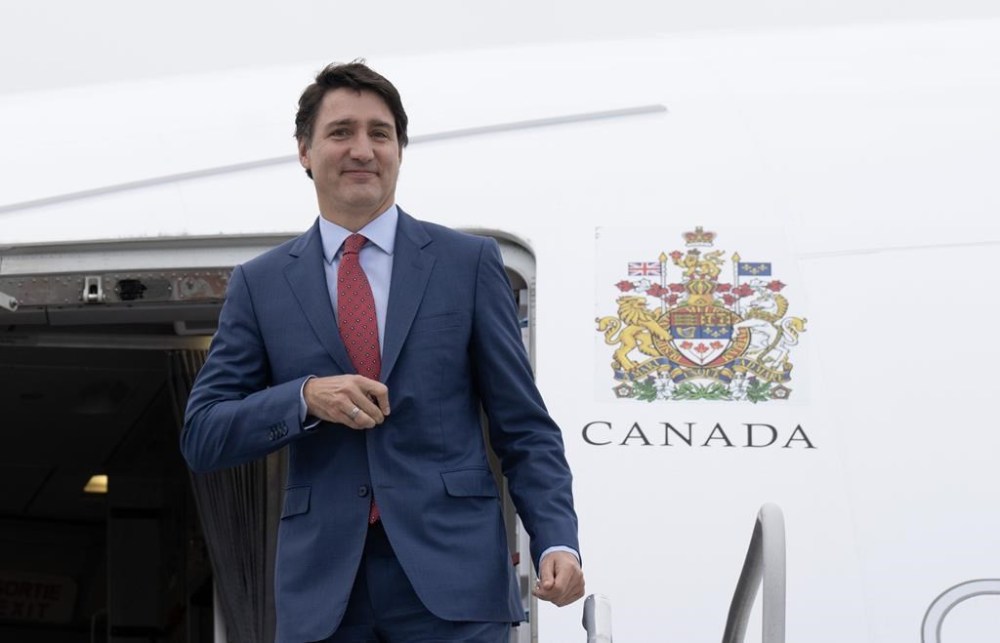 Prime Minister Justin Trudeau boards a Canadian government Airbus CC-330 Husky as he leaves for the APEC Summit, Vancouver, B.C., Wednesday, Nov. 15, 2023. Trudeau was rebuked Tuesday by his Israeli counterpart for a strongly worded statement calling for an end to the violence in the Gaza Strip. THE CANADIAN PRESS/Adrian Wyld