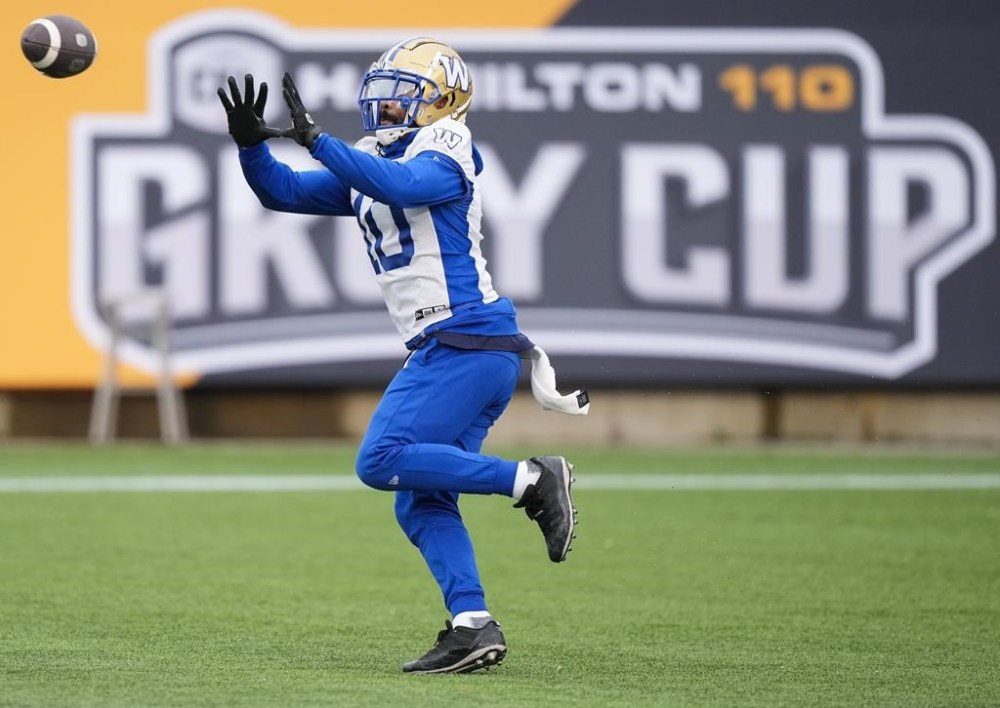 Winnipeg Blue Bombers wide receiver Nic Demski (10) catches the ball during practice ahead of the 110th CFL Grey Cup against the Montreal Alouettes in Hamilton, Ont., Friday, Nov. 17, 2023. Receivers Demski and Rasheed Bailey participated in limited practice for the Winnipeg Blue Bombers on Frida. The pair missed Winnipeg's first two practices at Tim Hortons Field ahead of Sunday's Grey Cup.THE CANADIAN PRESS/Nathan Denette