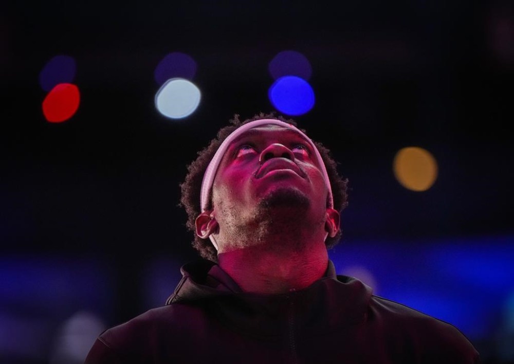 Toronto Raptors' Pascal Siakam stands on the court during the national anthems before a pre-season NBA basketball game against the Sacramento Kings, in Vancouver, B.C., Sunday, Oct. 8, 2023. Pascal Siakam is living a hip-hop head's dream. THE CANADIAN PRESS/Darryl Dyck