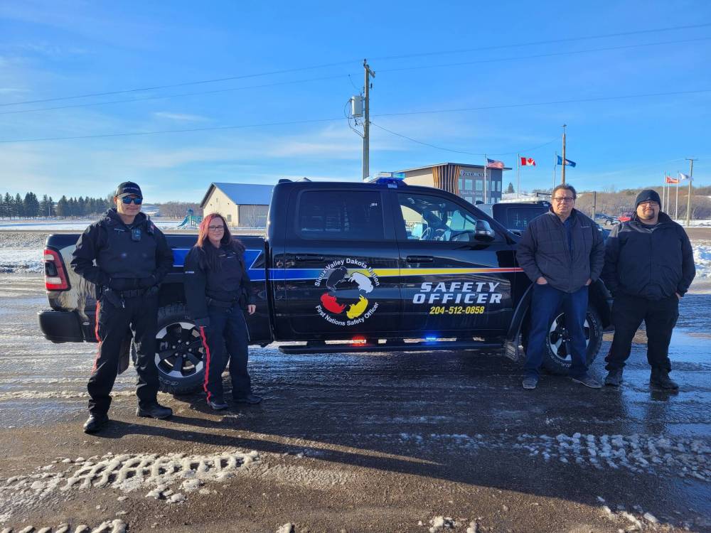 From left, First Nations safety officers Chris Tacan and Helena Maziwasicuna, Sioux Valley Dakota Nation Chief Vincent Tacan and First Nations safety officer Lance Mancheese. (Miranda Leybourne/The Brandon Sun)