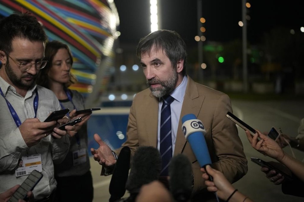 Steven Guilbeault, Canada environment and climate minister, speaks to members of the media at the COP28 U.N. Climate Summit, Tuesday, Dec. 12, 2023, in Dubai, United Arab Emirates. Guilbeault is hailing what he called the