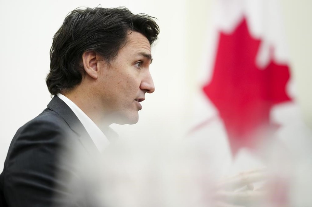 Prime Minister Justin Trudeau takes part in an interview at the Office of the Prime Minister and Privy Council in Ottawa on Monday, Dec. 11, 2023. THE CANADIAN PRESS/Sean Kilpatrick