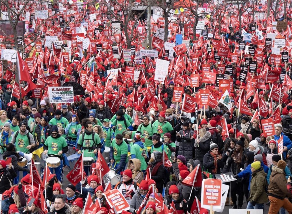 Unions affiliated with a Quebec labour alliance representing around 420,000 public sector workers have now reached tentative deals on salaries with the provincial government. Members of the FAE teachers union march to begin their strike, Thursday, Nov. 23, 2023, in Montreal.THE CANADIAN PRESS/Ryan Remiorz