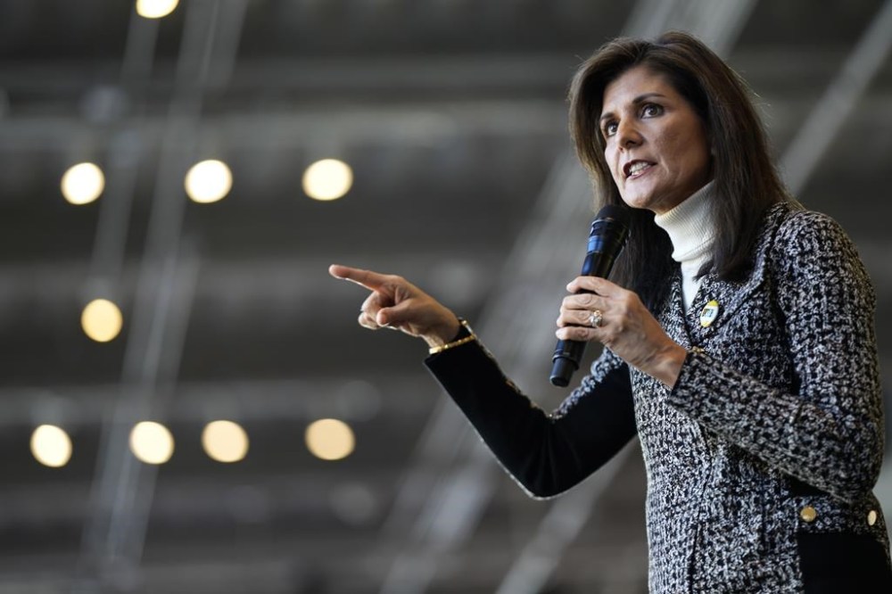 Republican presidential candidate Nikki Haley speaks during a campaign stop, Saturday, Dec. 30, 2023, in Coralville, Iowa. (AP Photo/Charlie Neibergall)