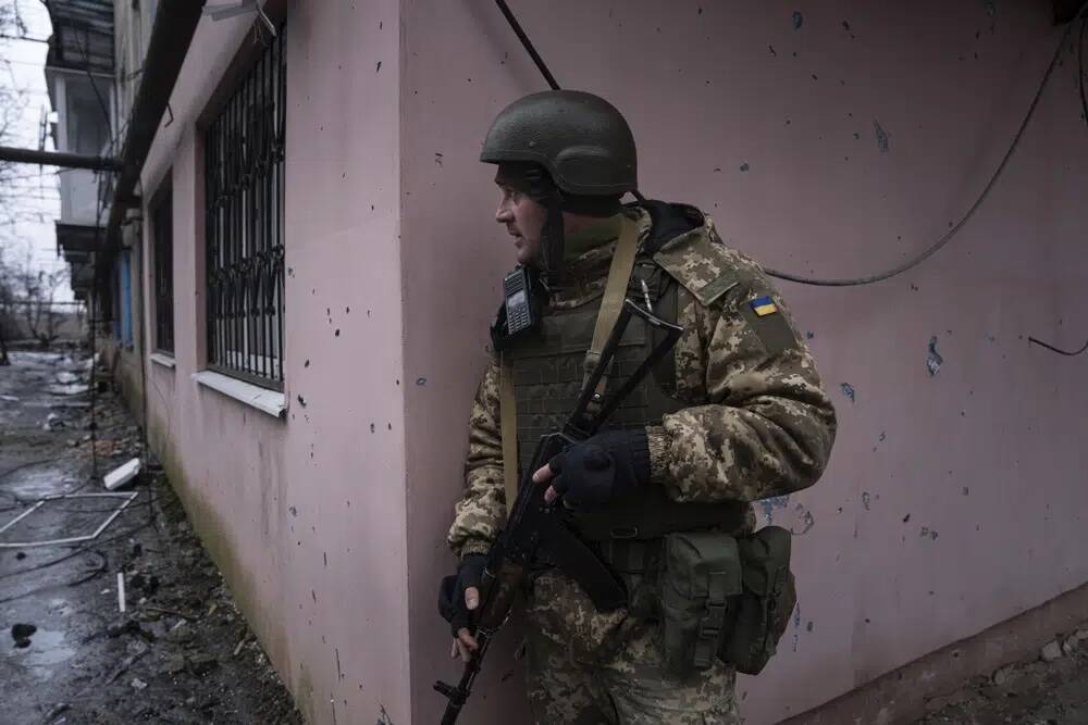 A Ukrainian marine serviceman prepares to change position during a patrol in the frontline city of Vuhledar, Ukraine on Feb. 25, 2023. Columnist Zack Gross laments that humanity's penchant for war seems as strong as ever, if not stronger. (The Associated Press)