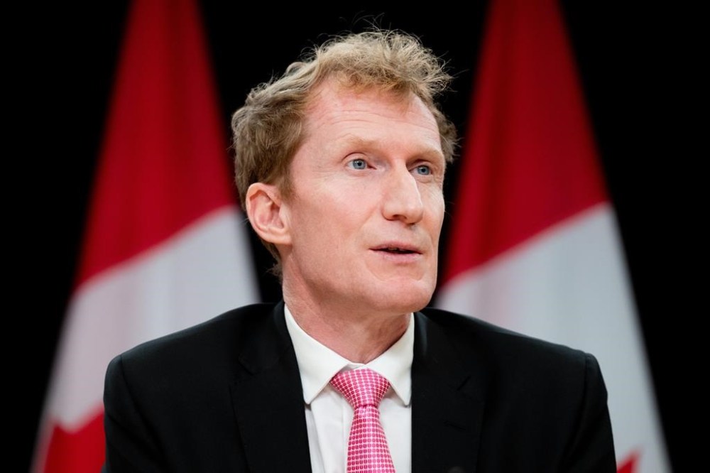 Immigration Minister Marc delivers remarks at a press conference in Ottawa, Thursday, Dec. 21, 2023. THE CANADIAN PRESS/Spencer Colby