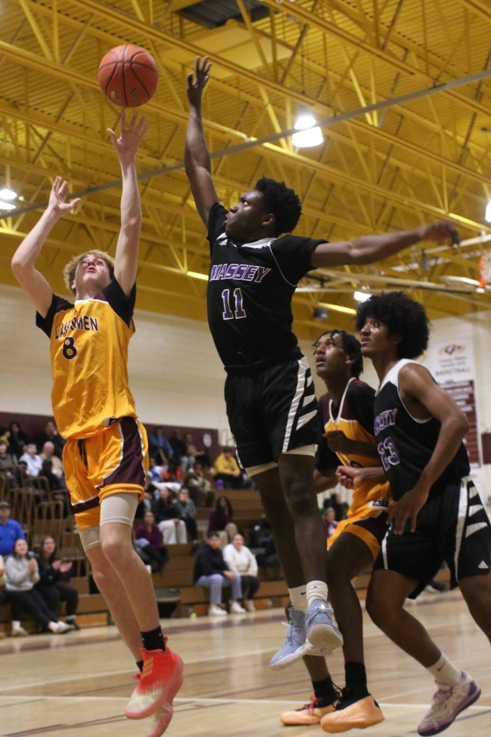 Vikings Temi Toogun jumps to block a Simon Leckie shot.