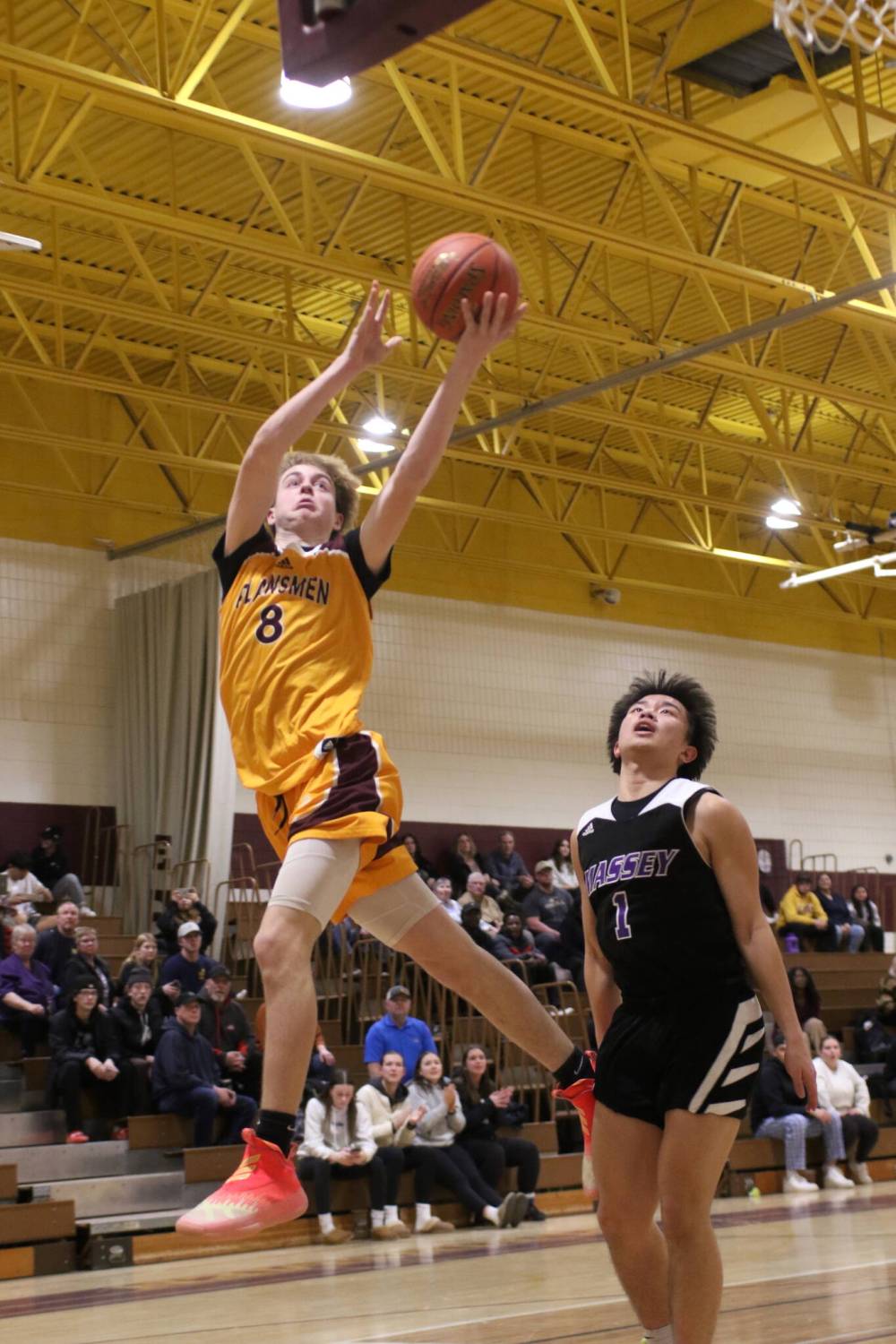 Crocus Plainsmen Simon Leckie makes a tough layup.