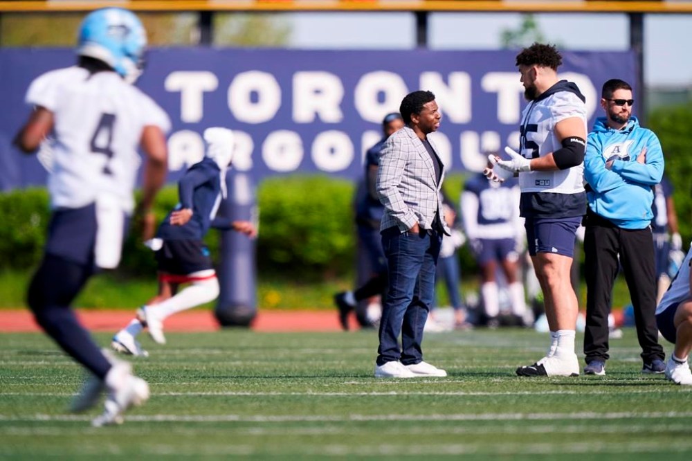 Offensive lineman Darius Bladek (right) talks with general manager Mike (Pinball) Clemons during the first day of the Toronto Argonauts training camp at Alumni Stadium at the University of Guelph in Guelph, Ont. on Sunday, May 14, 2023. Keeping Toronto’s staunch defence intact promises to be a big challenge for Clemons.THE CANADIAN PRESS/ Geoff Robins