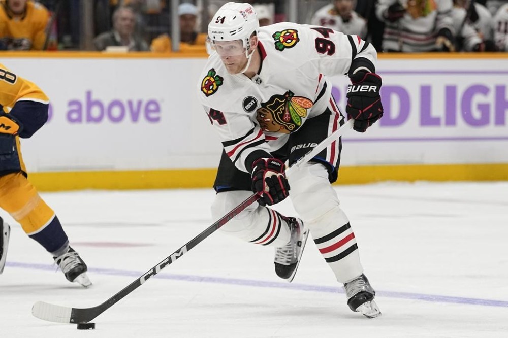 FILE - Chicago Blackhawks right wing Corey Perry (94) plays during the first period of an NHL hockey game against the Nashville Predators, Nov. 18, 2023, in Nashville, Tenn. Perry is eligible to sign an NHL contract with any team in the aftermath of the Blackhawks terminating his deal for this season, citing inappropriate conduct. (AP Photo/George Walker IV, File)