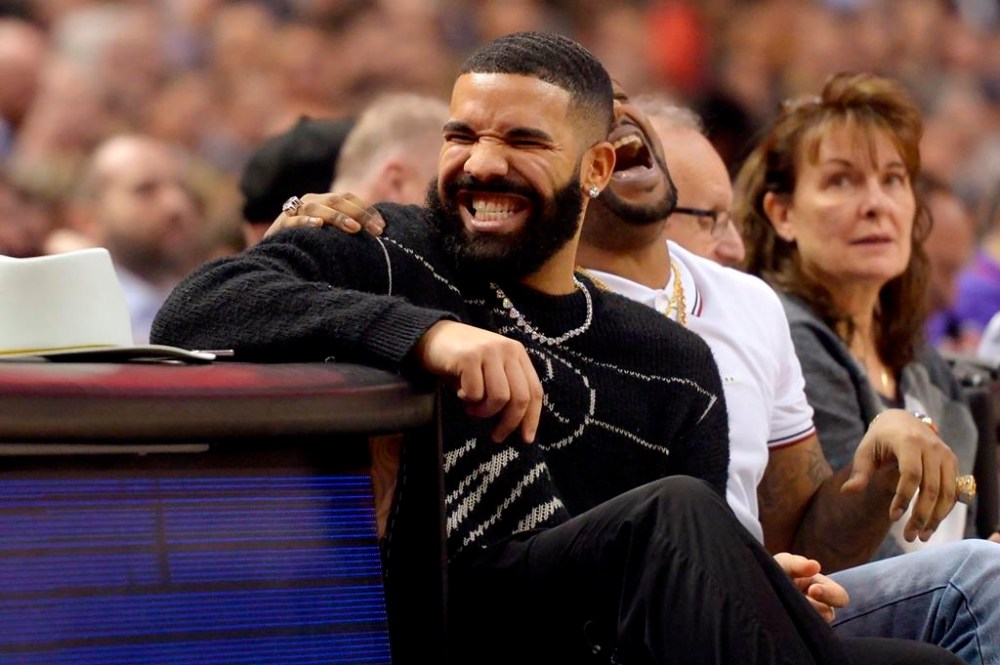 Performer Drake has a laugh courtside during first half NBA basketball action between the Toronto Raptors and the Milwaukee Bucks, in Toronto, Tuesday, Feb. 25, 2020. UFC president Dana White reposted a betting slip from Drake's verified Instagram account showing the Toronto rapper has wagered $700,000 on Strickland to beat South African challenger Dricus (Stillknocks) Du Plessis. The estimated payout is $1.379 million. THE CANADIAN PRESS/Nathan Denette
