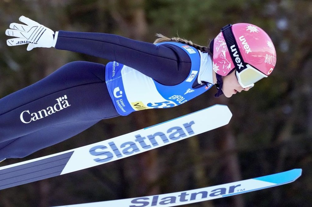 Canada's Abigail Strate competes at the Women Normal Hill Individual Ski Jumping World Cup event in Villach, Austria, Thursday, Jan. 4, 2024. THE CANADIAN PRESS/AP-Darko Bandic