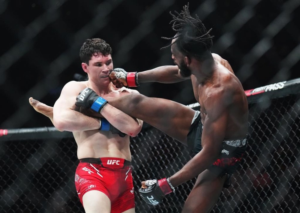 Mike Malott, left, fights Neil Magny during a welterweight bout at UFC 297 in Toronto on Saturday, Jan. 20, 2024. THE CANADIAN PRESS/Nathan Denette