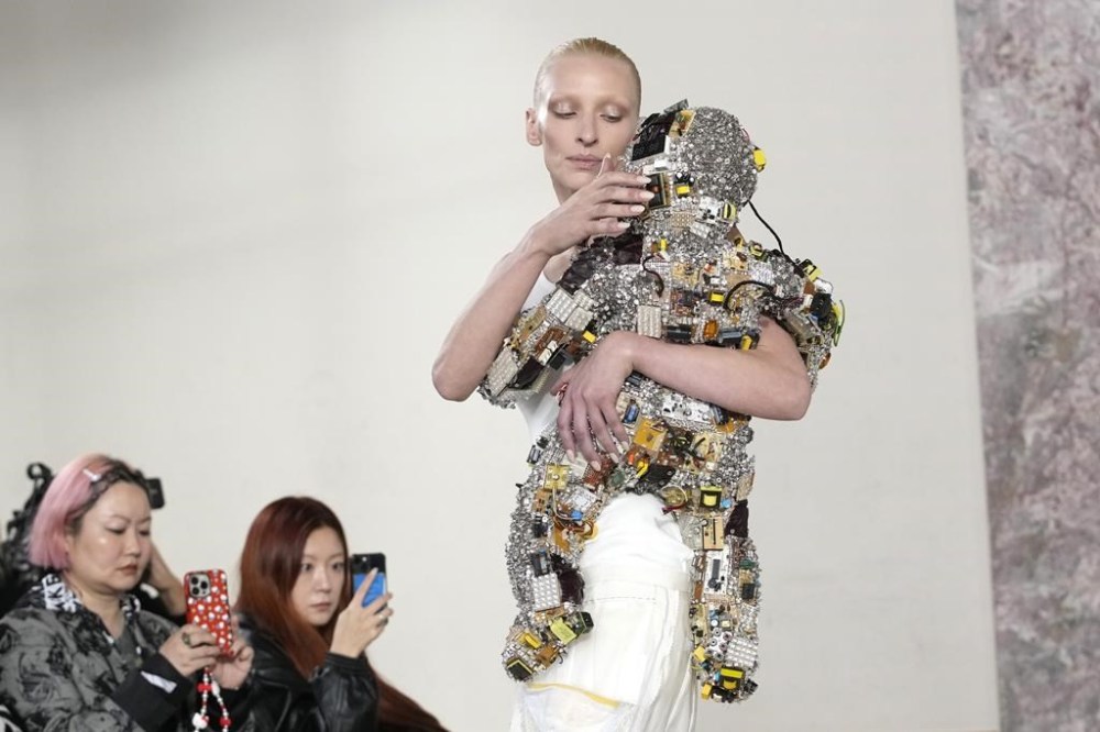 A model wears a creation for Schiaparelli's Haute Couture Spring-Summer 2024 collection presented in Paris, Monday, Jan. 22, 2024. (AP Photo/Christophe Ena)