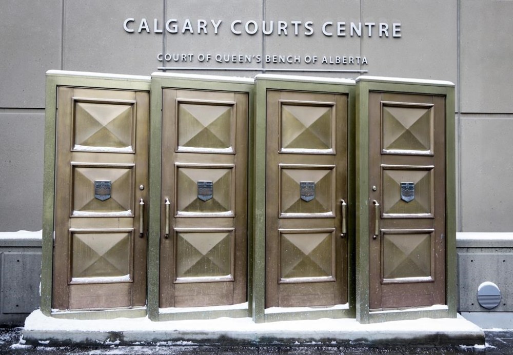 Doors from the original courthouse at the entrance to the Calgary Courts Centre in Calgary on Friday, Jan. 18, 2019. THE CANADIAN PRESS/Jeff McIntosh