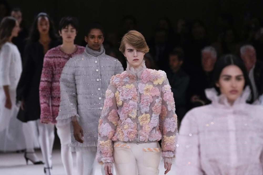 Chanel’s spring couture show is a button-inspired ballet on the Paris ...