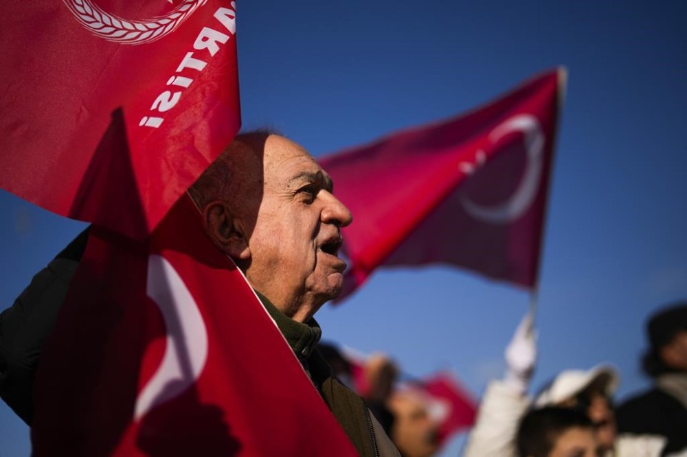 People shout slogans during a protest against the Sweden's NATO membership called by Turkish Vatan, or Patriotic Party, in Istanbul, Turkey, Tuesday, Jan. 23, 2024. Turkish legislators plan to vote Tuesday on Sweden's bid to join NATO, in a step that could remove a major hurdle for the previously nonaligned Nordic country's entry into the military alliance. (AP Photo/Francisco Seco)