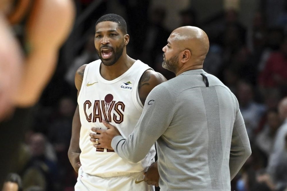 Cleveland Cavaliers' Tristan Thompson, left, is held back by head coach J.B. Bickerstaff, after Thompson was called for a technical foul during the second half of an NBA basketball game against the Washington Wizards, Friday, Jan. 5, 2024, in Cleveland. Cleveland centre Thompson has been suspended 25 games by the NBA for violating its anti-drug program. THE CANADIAN PRESS/AP/Nick Cammett