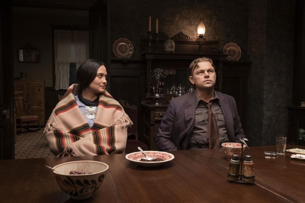 This image released by Apple TV+ shows Lily Gladstone, left, and Leonardo DiCaprio in a scene from