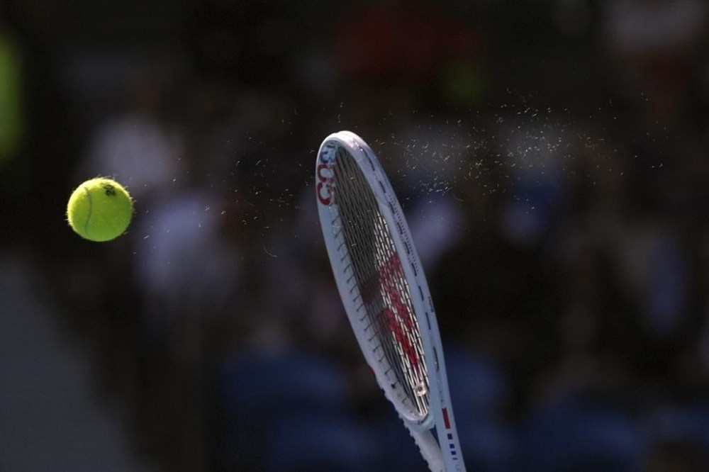 Athletes compete during a match at the Australian Open tennis championships at Melbourne Park, Melbourne, Australia, Monday, Jan. 22, 2024. THE CANADIAN PRESS/AP, Andy Wong