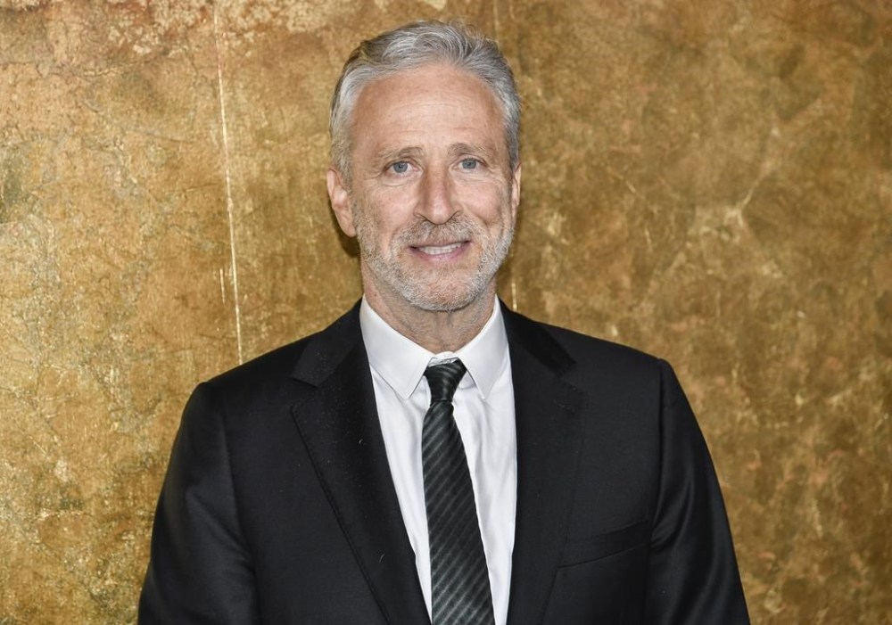 FILE - Jon Stewart attends The Albies hosted by the Clooney Foundation for Justice at the New York Public Library in New York on Sept. 28, 2023. Stewart is rewinding the clock, returning to “The Daily Show” as an occasional host and executive producing through the 2024 U.S. elections cycle. Comedy Central on Wednesday said Stewart will host the topical TV show, the perch he ruled for 16 years starting in 1999, every Monday starting Feb. 12. (Photo by Evan Agostini/Invision/AP, File)